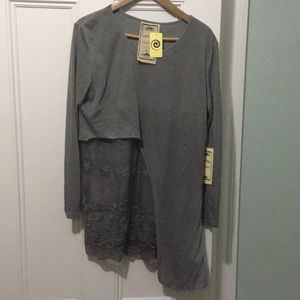 Gray asymmetrical sweater with lace underlay